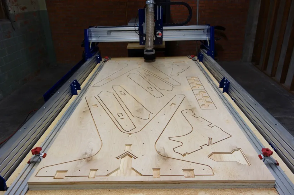 Fabrication of a table by CNC milling, using designs from OpenDesk. (source: r26d.com)